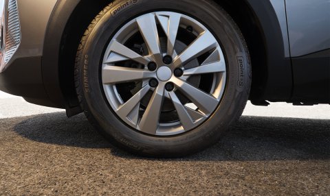 A close up shot a Point S Summer tyre fitted on a gray SUV