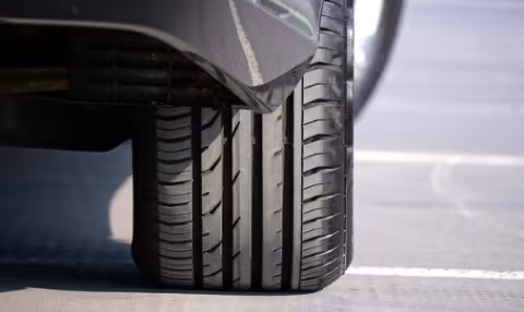 A close-up shot of a runflat tyre fitted to a car
